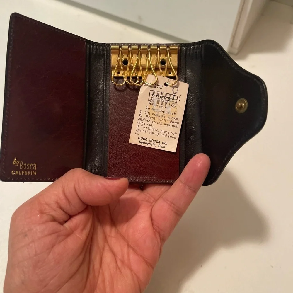 Bosca beautiful new keyholder with packets. seude with brown leather